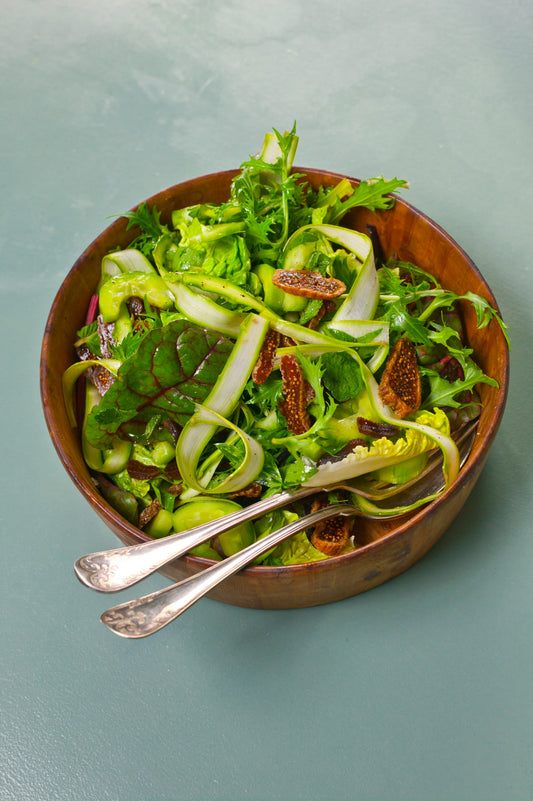 Garden Fresh Salad Bowl - fresh lettuce, cucumber, tomato, carrot and capsicum in a wooden bowl